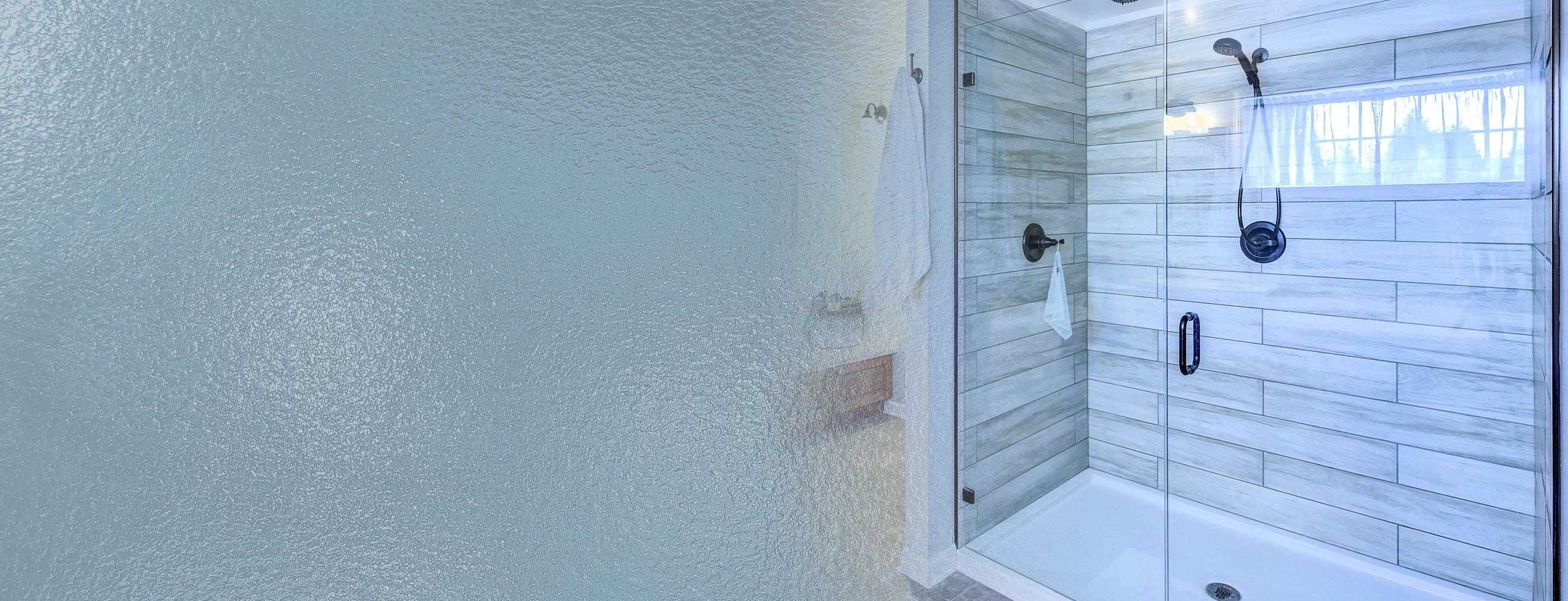 Frameless glass shower door designed and installed by CA Glass in a New Jersey bathroom