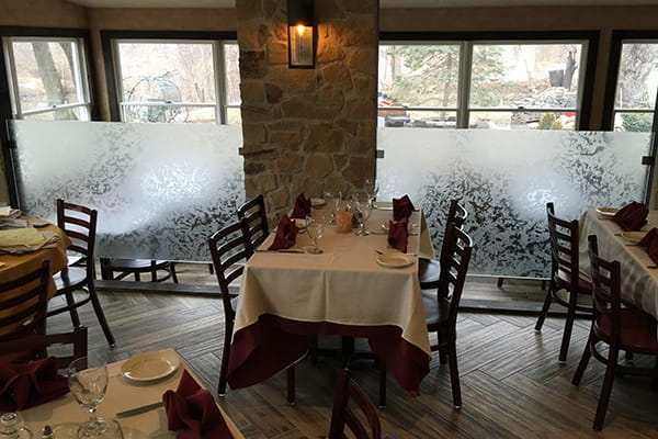 Custom angled glass partitions for unique interior layouts