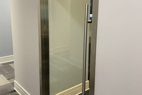 Transparent glass partitions for collaborative conference spaces