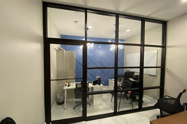 Minimalist frameless glass partitions enhancing openness