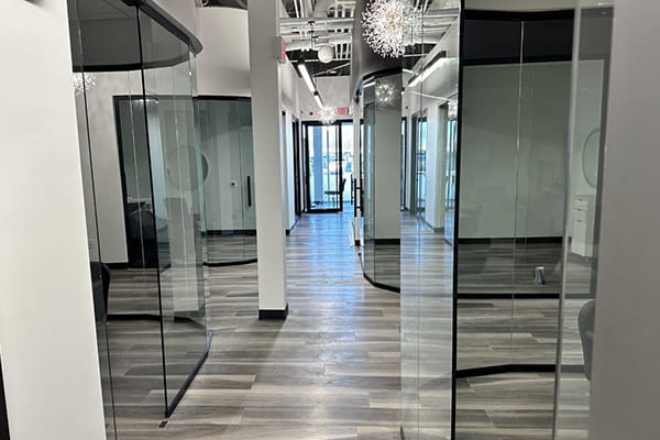 Convenient sliding glass partitions for dynamic interiors