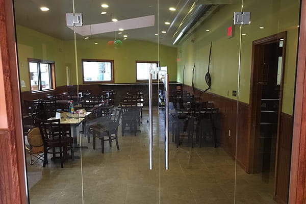 Expert installation of tinted glass partitions for modern offices