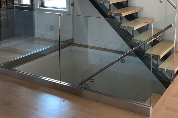 Shoe base glass railing for staircase designs