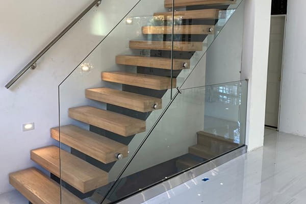 Interior shoe base glass railing for homes