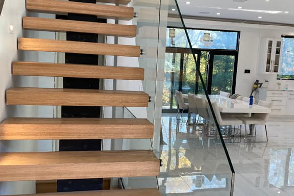 Standoff Glass Railing Indoor Stair Application