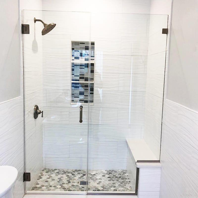 Inline frameless shower door with glass panels custom-installed by CA Glass in New Jersey