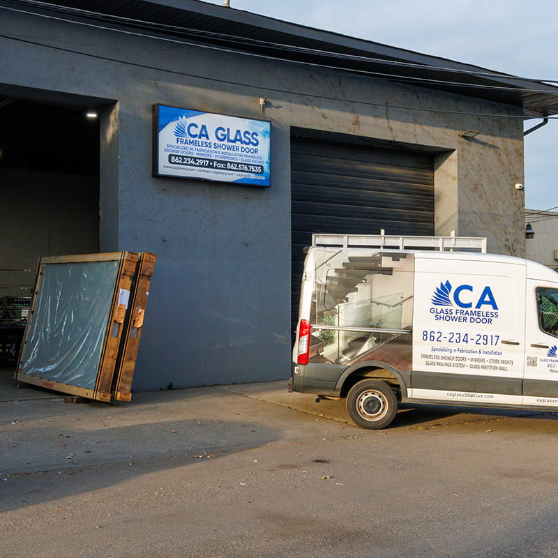 CA Glass showroom in Livingston, New Jersey displaying custom frameless glass shower doors and premium glass design options