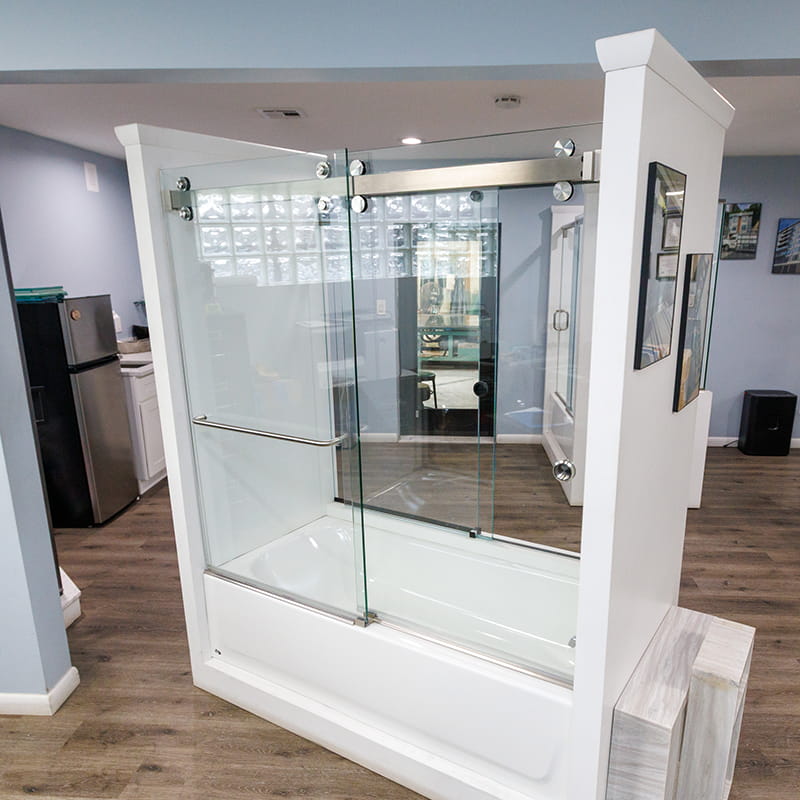 CA Glass showroom in Summit, New Jersey displaying custom frameless glass shower doors and premium glass design options