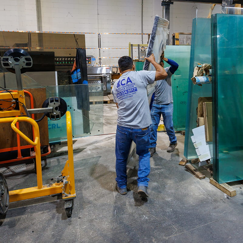 CA Glass team fabricating a custom frameless glass shower enclosure for a East Hanover, New Jersey home