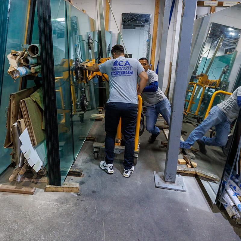 CA Glass team fabricating a custom frameless glass shower enclosure for a Livingston, New Jersey home