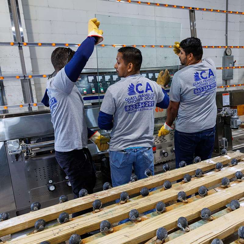 CA Glass team fabricating a custom frameless glass shower enclosure for a Springfield, New Jersey home